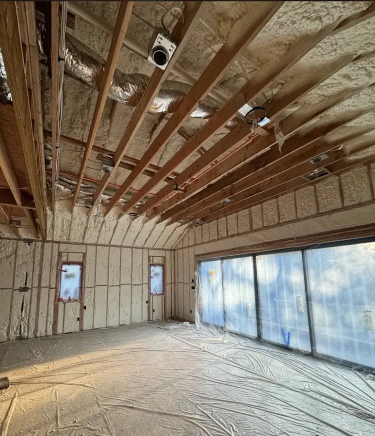Interior walls and ceiling insulated with spray foam during new construction in North Highlands